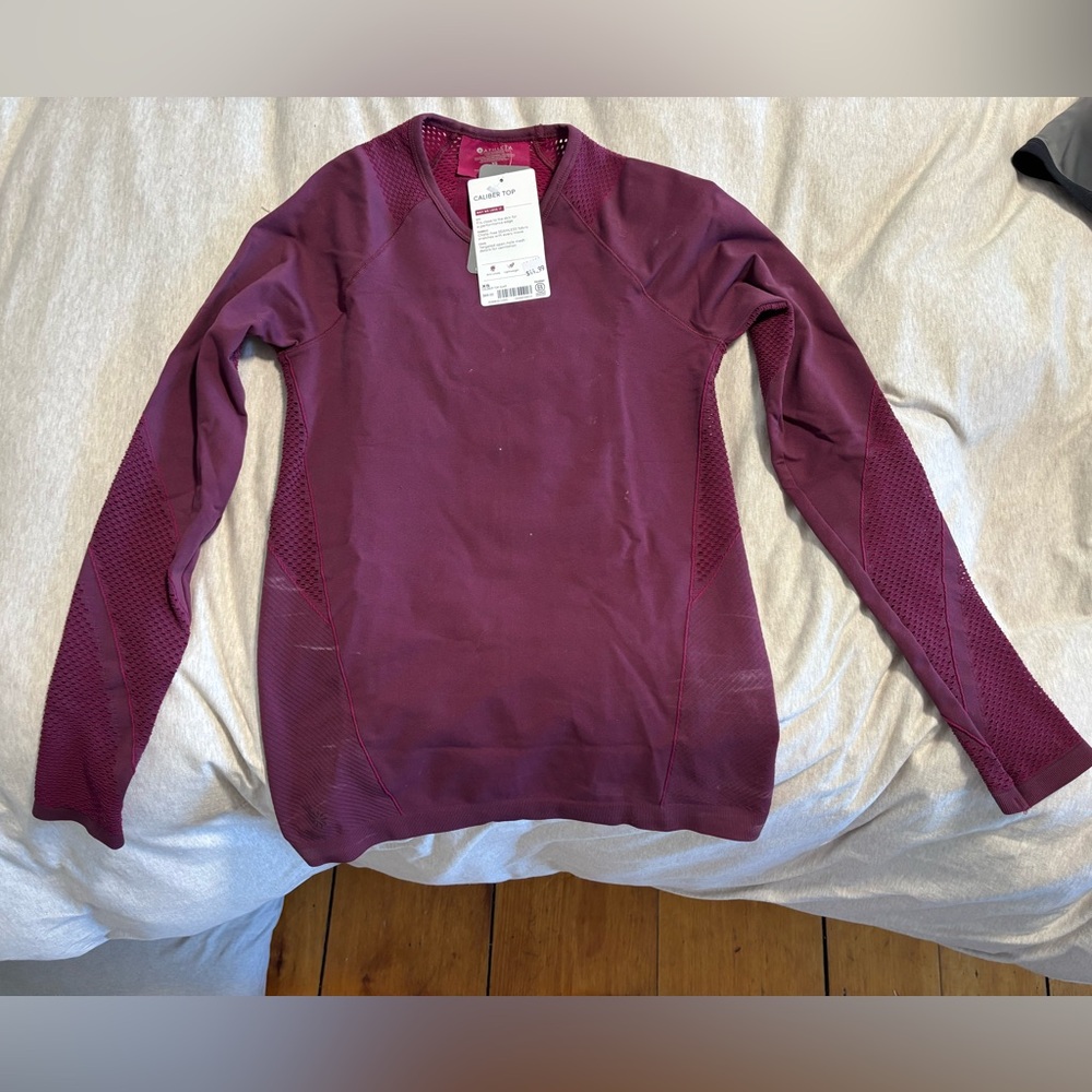NWT unsinkable caliber top.